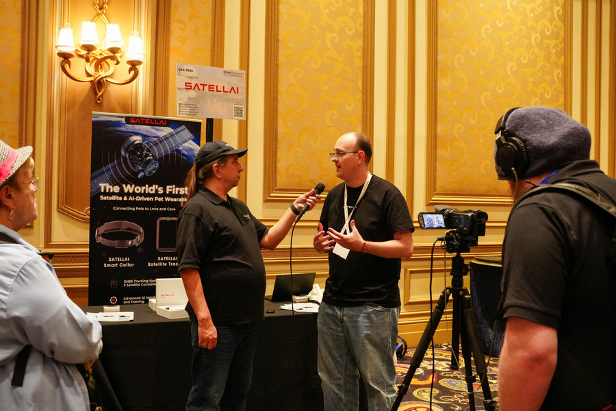 SATELLAI team presenting the satellite AI pet wearable at CES 2025.